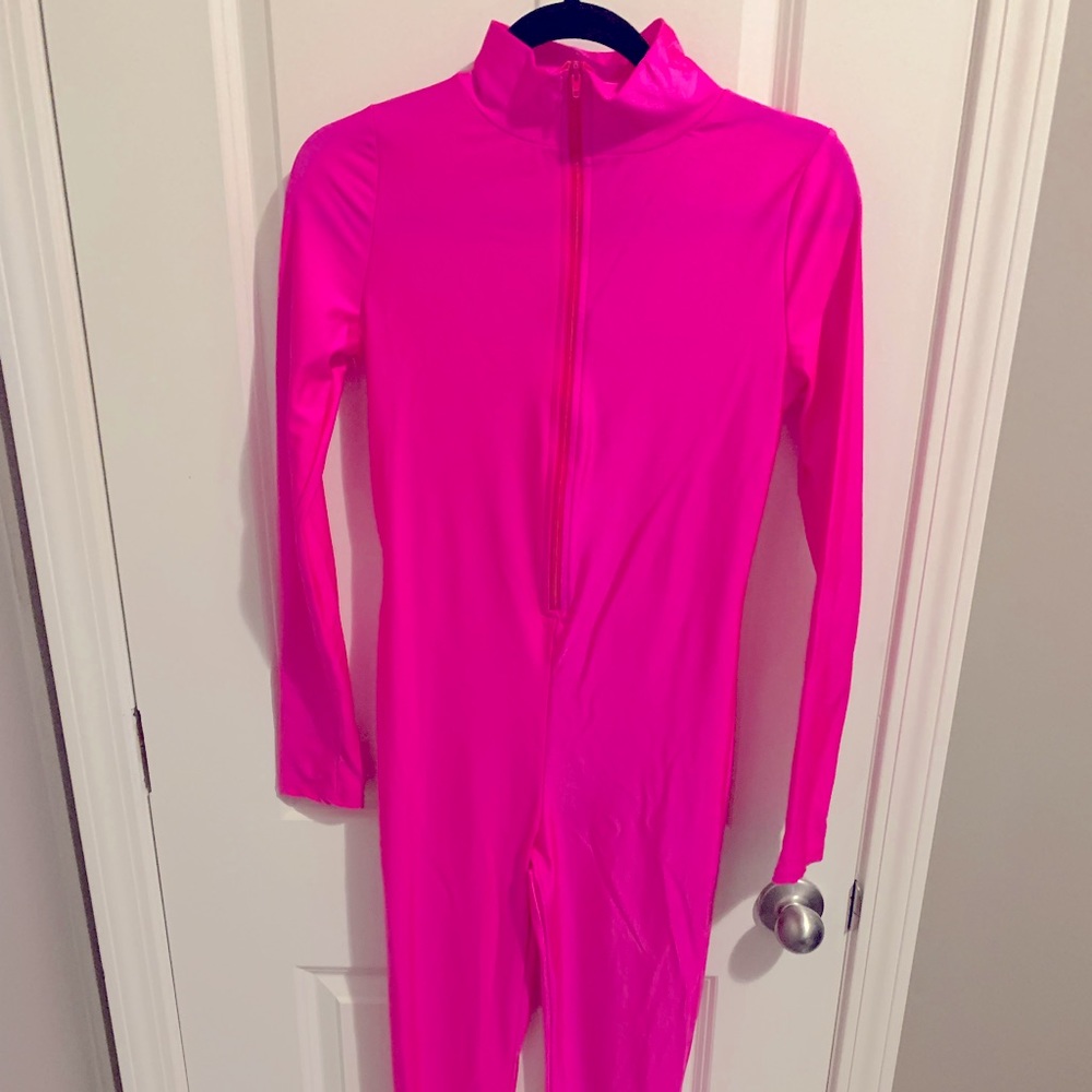 Neon pink stretchy long sleeve bodysuit with zipper.